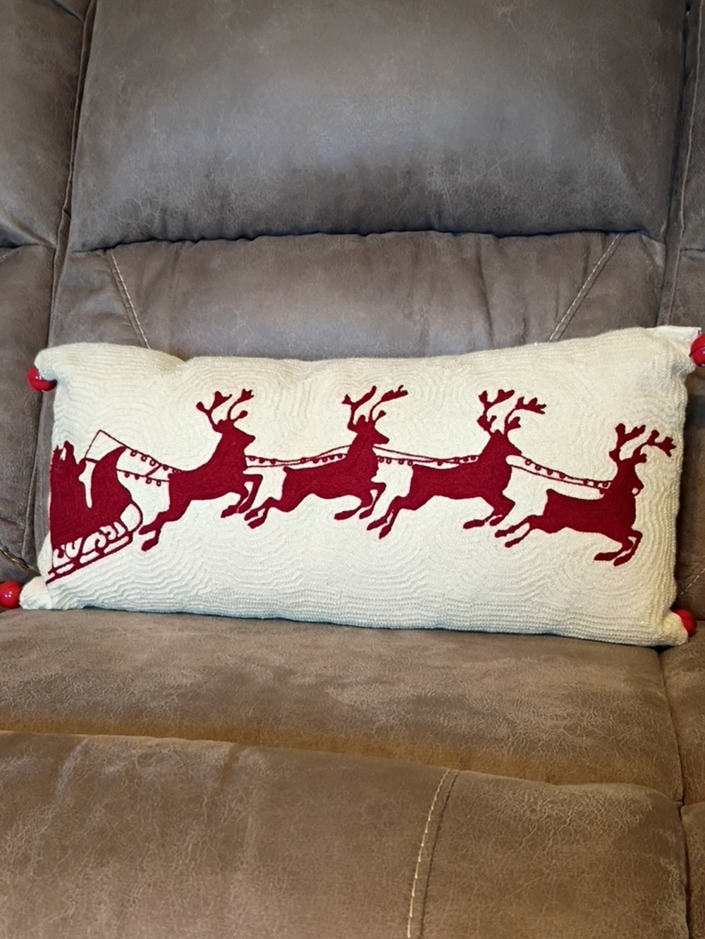 Festive Red Reindeer Lumbar Pillow on Cream